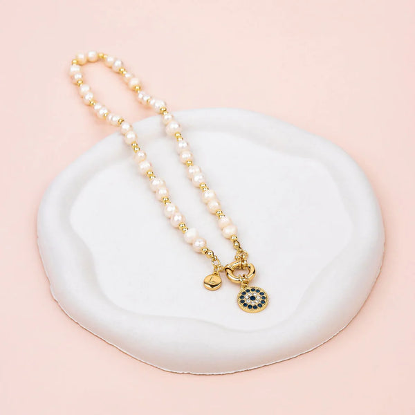 Yellow Gold Eye Pendant on Freshwater Pearl Necklace